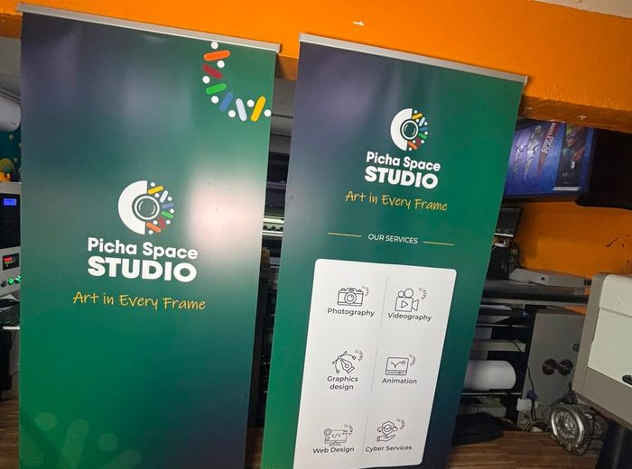 Pair of branded roll-up banners printed by Ocean Graphics